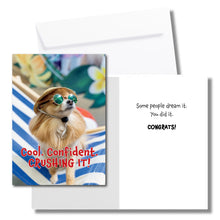 Load image into Gallery viewer, A congratulations greeting card. The front has a small chihuahua dog wearing sunglasses and text that reads, "Cool. Confident. CRUSHING IT!" The inside says, "Some people dream it. You did it. CONGRATS!" Includes a white envelope.

